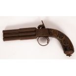 A triple barrel percussion cap pistol with brass stringing to the handle,