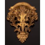 A carved gilt wood wall bracket and a gilt metal three-branch table light CONDITION