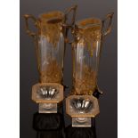 A pair of 1930s gilt metal mounted two-handled vases, 22.