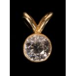 A round cut diamond mounted as a pendant in 18ct yellow gold, the stone of approximately 1.