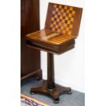 A late Regency rosewood games/worktable,