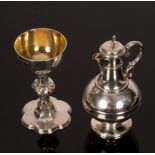 A silver travelling communion set, WBJ, London 1882, comprising chalice and ewer,