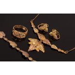 A tri-colour 9ct gold pendant necklace of fruiting vine leaf design, a similar ring,