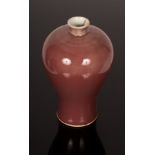 A Chinese monochrome porcelain vase, 20th Century, in underglaze red, Hongyou,