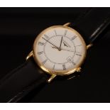 A gentleman's 18k gold cased Longines wristwatch the dial with Roman numerals and date aperture,