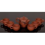 A set of Yixing Zisha tea pot and six tea cups in box, 20th Century, the base marked 'Huihe Taoyi',