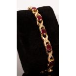 A ruby and diamond bracelet,