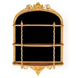 A 19th Century mirror back étagère with shell and harebell surmount and beaded clad columns,