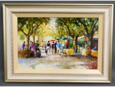 A framed oil on panel of French continental street