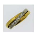 An 18ct two colour gold ring set with nine small d