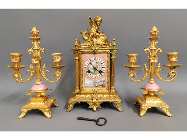 A 19thC. gilt bronze ormolu French clock garniture