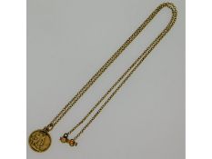 A 9ct gold St. Christopher pendant & 16in chain, 2