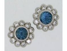 A pair of 18ct white gold earrings set with approx
