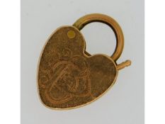 A c.1900 15ct gold padlock, monogrammed, 2.7g