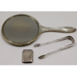 A silver backed vanity mirror, a pair of Edinburgh