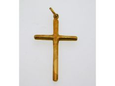 A yellow metal cross, electronically tests as 18ct