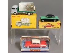 Three boxed Dinky diecast toy vehicles, model numb