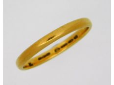 A 22ct gold band, 2.4g, size N/O