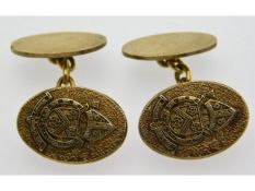 A pair of gold plated silver cufflinks with crest