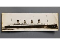 A rare, original pre-sinking issue Signal Series postcard featuring White Star RMS Titanic, 11in lon