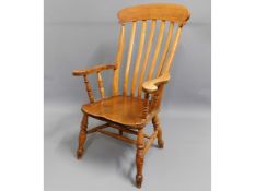 A 19thC. elm Windsor chair, 44.5in high to back