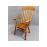 A 19thC. elm Windsor chair, 44.5in high to back