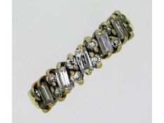 A 9ct gold half eternity style ring set with white