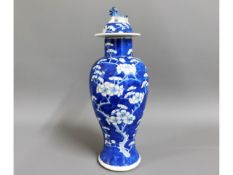 A 19thC. Chinese lidded prunus baluster vase with