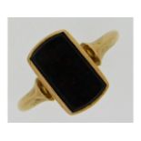 A 9ct gold signet ring set with a 13mm wide blood