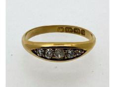 An antique 18ct gold ring set with five small old