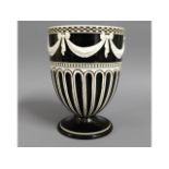 An early 19thC. Wedgwood vase with garland decor,