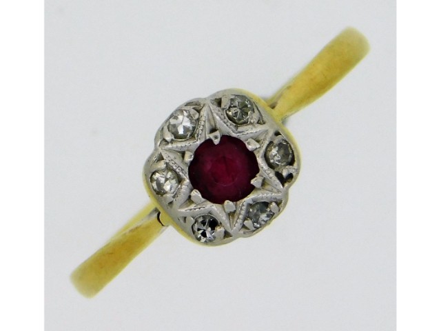 An antique 18ct gold ring set with diamond & ruby,