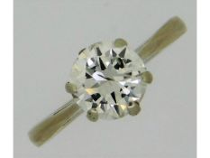 An 18ct white gold solitaire ring set with diamond of approx. 1.03ct of good clarity in Tiffany styl