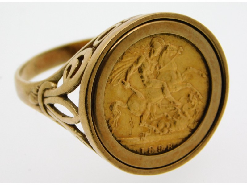 A 9ct gold mounted half sovereign ring, sovereign