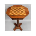 A 19thC. rosewood veneered chess table, 29in high
