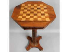 A 19thC. rosewood veneered chess table, 29in high