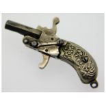 A silver (tested) & base metal miniature charm pistol, complete with firing action, 42mm long, 6.3g