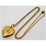 A Victorian 15ct gold heart shaped locket set with small diamond, 25.5mm x 21.75mm, 5.5g, on an 18in