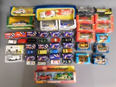 A quantity of mixed boxed diecast toy vehicles inc