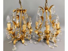 A pair of ornate Christopher Wray gilt chandelier