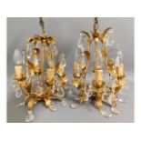 A pair of ornate Christopher Wray gilt chandelier