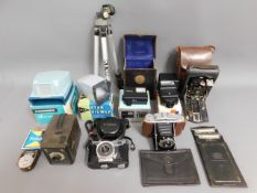 A selection of photography equipment including Yas