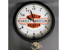 A fluorescent lit Harley Davidson electric wall cl