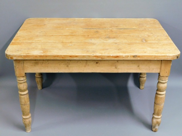 An antique pine scrub top farmhouse table with dra