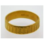 A 24ct gold band, size N/O, 4.5g
