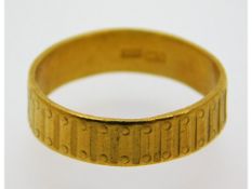 A 24ct gold band, size N/O, 4.5g