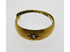 An antique 15ct gold gipsy ring set with small old