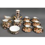 A set of six Royal Crown Derby 6041 imari coffee c