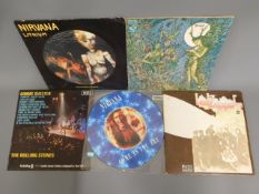 Two Nirvana 12in picture discs twinned with Rollin