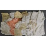 A quantity of mixed linen including apron, child's